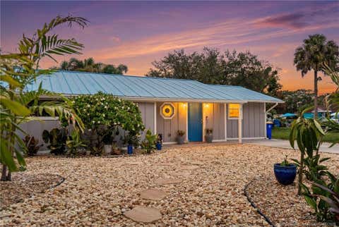 Photo of 2495 NE Hickory Avenue, Jensen Beach, FL 34957 (MLS # M20055918)