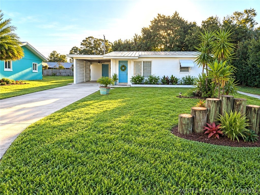 Photo of 1621 NE Maureen Court NE, Jensen Beach, FL 34957 (MLS # M20057074)