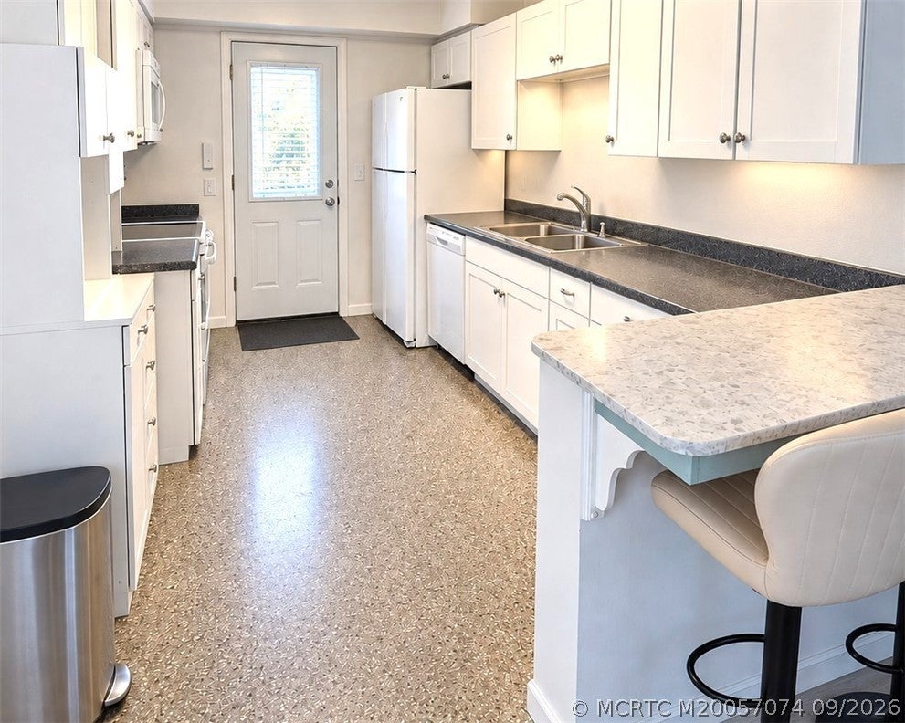 Photo of 1621 NE Maureen Court NE, Jensen Beach, FL 34957 (MLS # M20057074)