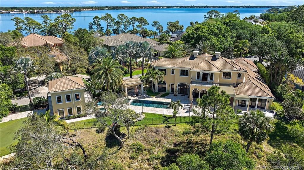 Photo of 511 NW Winters Creek Road, Palm City, FL 34990 (MLS # M20050422)