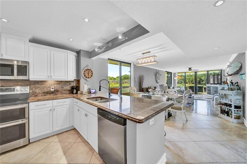 Photo of 10680 S Ocean Drive #1, Jensen Beach, FL 34957 (MLS # M20053940)