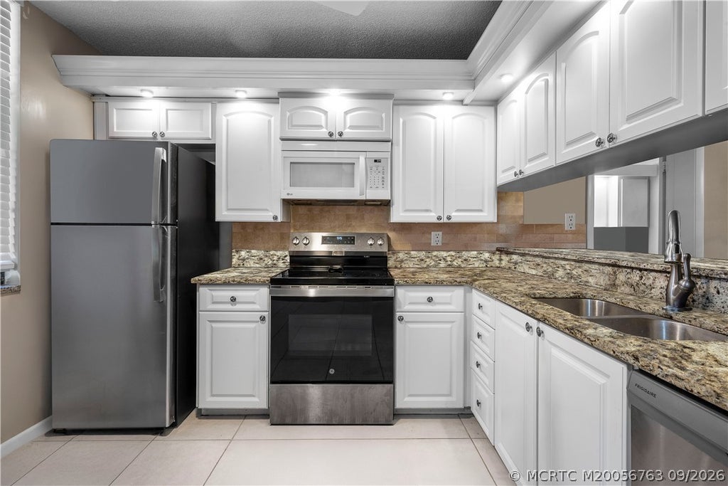 Photo of 3540 Whitehall Drive #306, West Palm Beach, FL 33401 (MLS # M20056763)