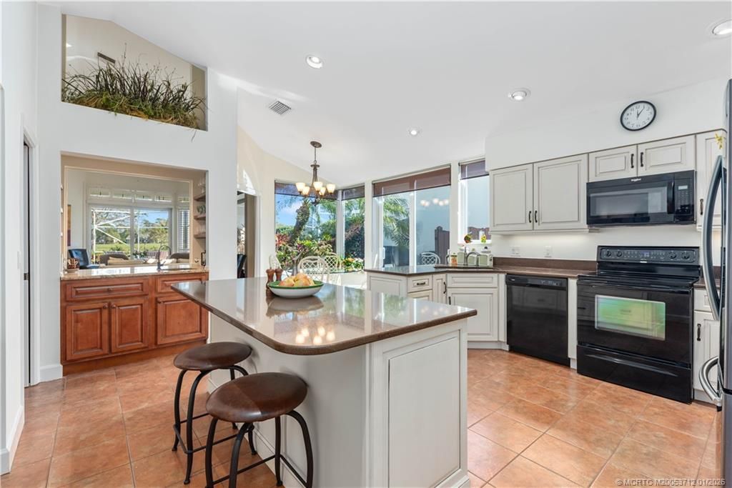 Photo of 13265 Harbour Ridge Boulevard, Palm City, FL 34990 (MLS # M20053712)