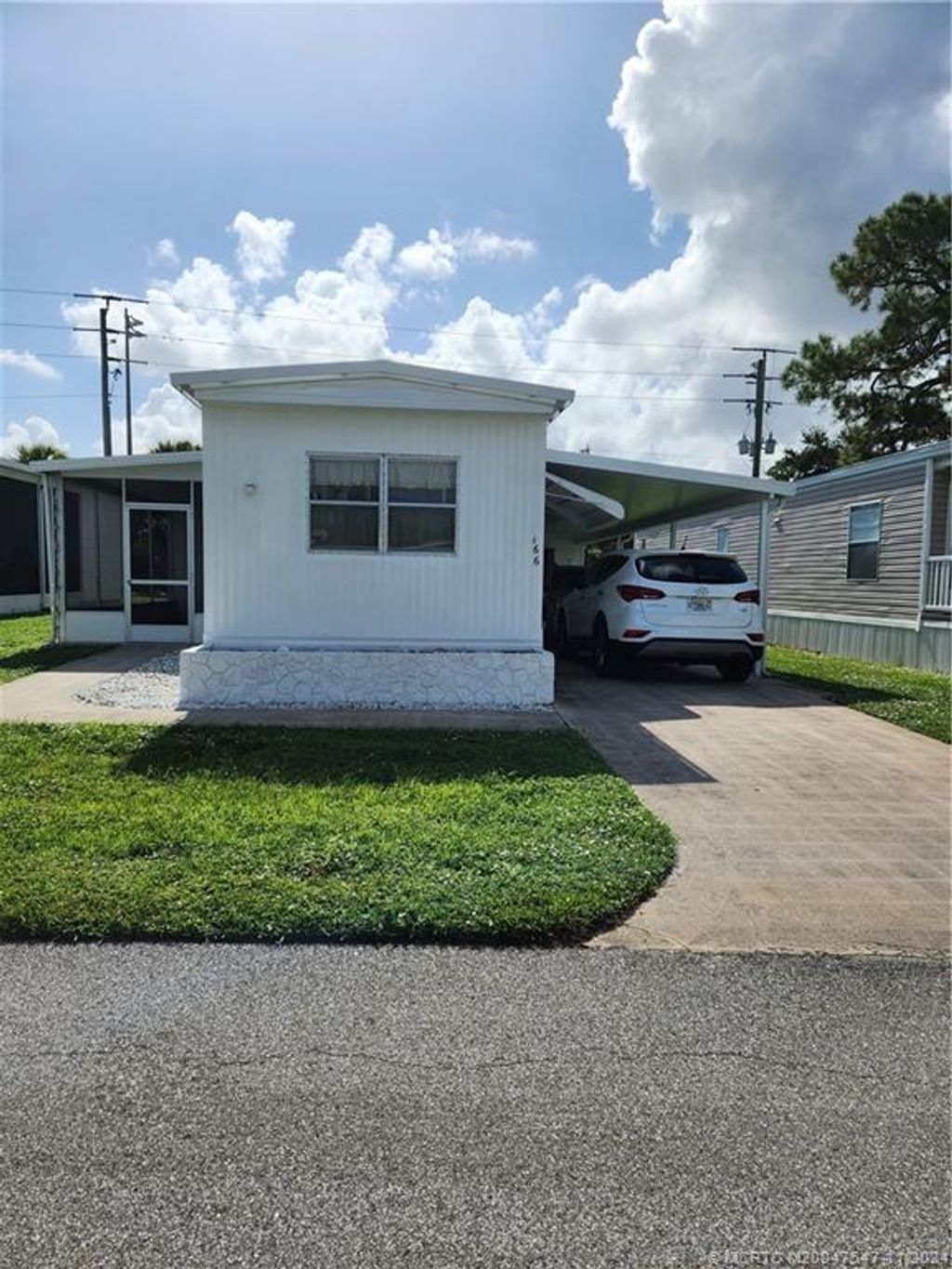 Photo of 166 SE Trafalgar Terrace, Stuart, FL 34994 (MLS # M20047547)