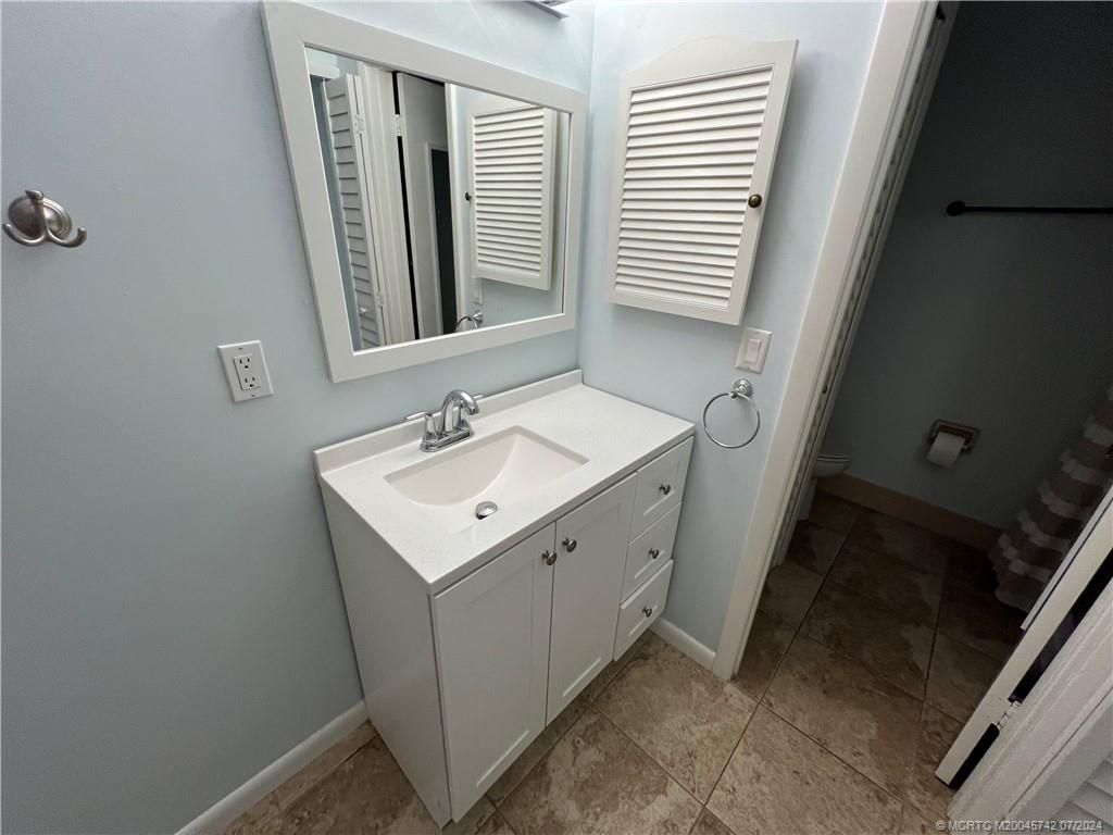 Photo of 1172 NE Coy Senda, Jensen Beach, FL 34957 (MLS # M20045742)