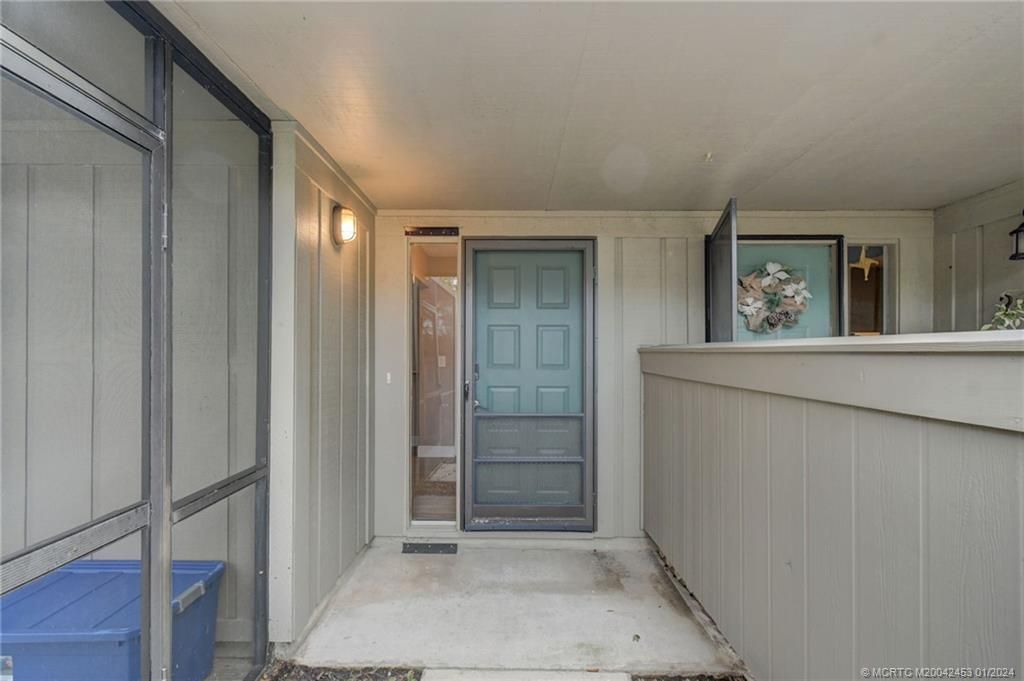 Photo of 4031 NW Cinnamon Tree Circle, Jensen Beach, FL 34957 (MLS # M20042453)