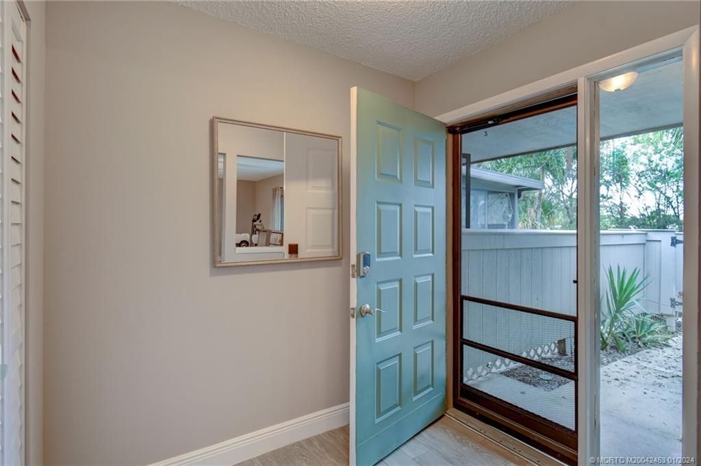 Photo of 4031 NW Cinnamon Tree Circle, Jensen Beach, FL 34957 (MLS # M20042453)