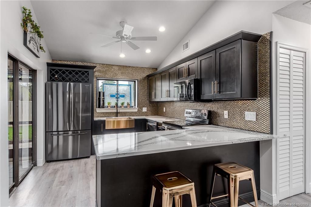 Photo of 5110 SE Hanson Circle, Stuart, FL 34997 (MLS # M20041466)