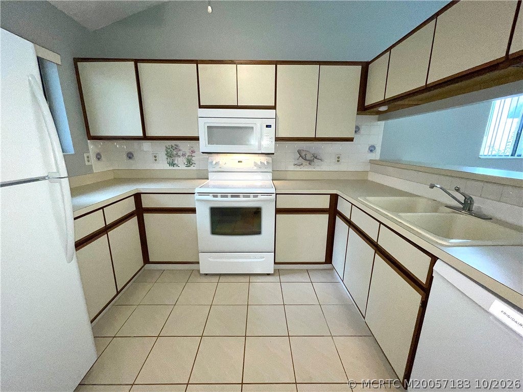 Photo of 1644 SW Crossing Circle, Palm City, FL 34990 (MLS # M20057183)