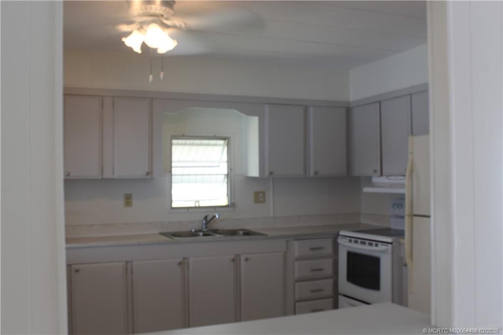 Photo of 605 NE South Seas Way, Jensen Beach, FL 34957 (MLS # M20054406)