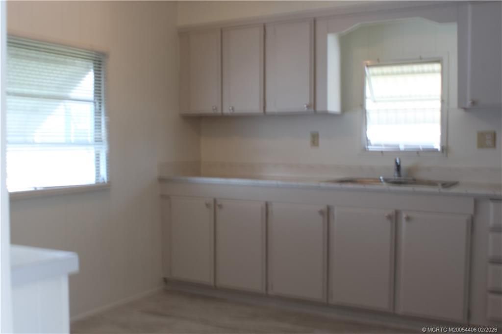 Photo of 605 NE South Seas Way, Jensen Beach, FL 34957 (MLS # M20054406)