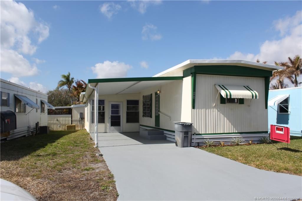 Photo of 605 NE South Seas Way, Jensen Beach, FL 34957 (MLS # M20054406)