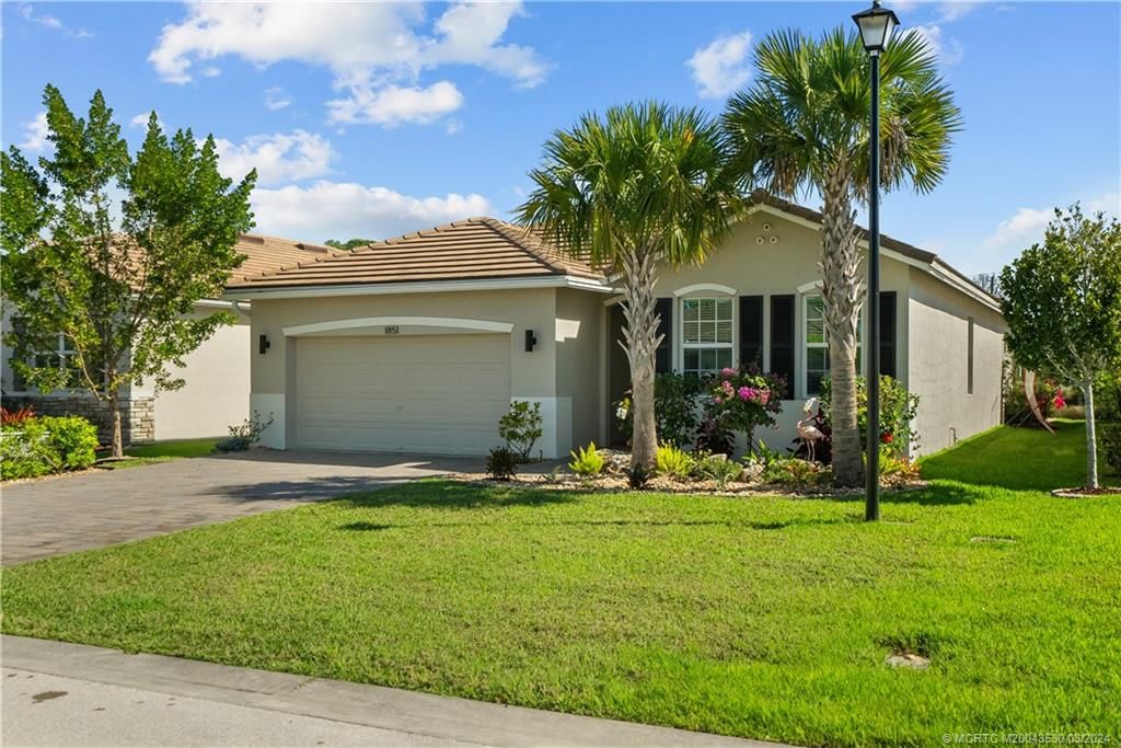 Photo of 1851 NW Golden Oak Trail, Jensen Beach, FL 34957 (MLS # M20043530)