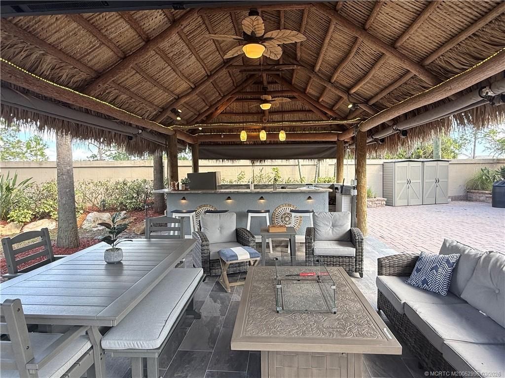 Photo of 80 NW Putter Pointe, Port Saint Lucie, FL 34986 (MLS # M20052996)