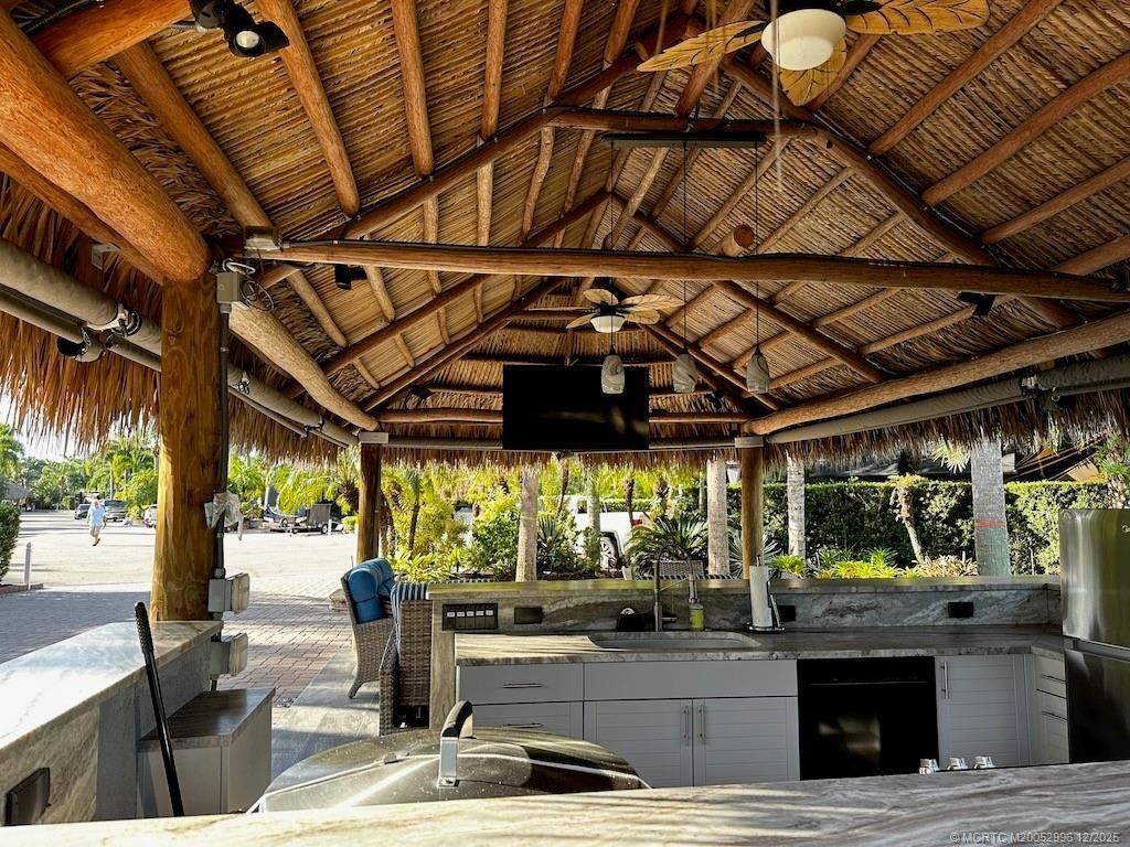 Photo of 80 NW Putter Pointe, Port Saint Lucie, FL 34986 (MLS # M20052996)