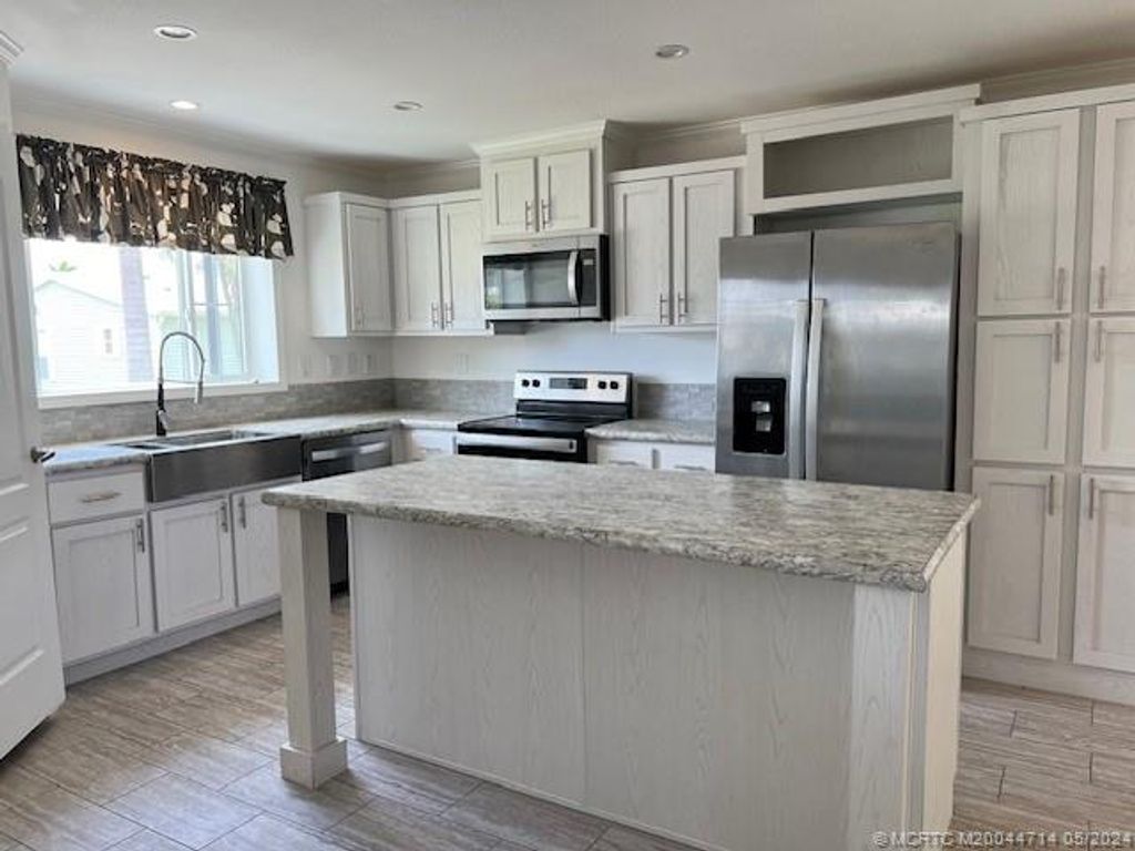 Photo of 4237 72nd Street N, West Palm Beach, FL 33404 (MLS # M20044714)