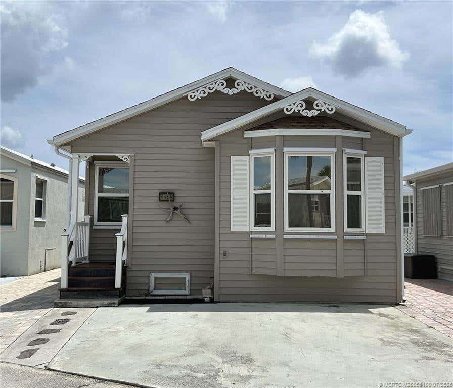 Photo of 1154 Nettles Boulevard, Jensen Beach, FL 34957 (MLS # M20056180)