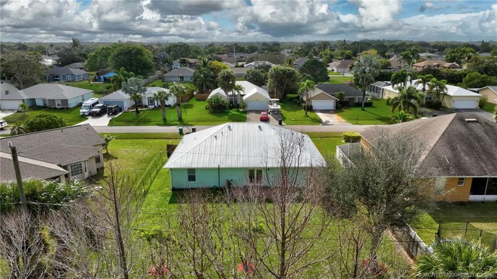 Photo of 2351 SE Maslan Avenue, Port Saint Lucie, FL 34952 (MLS # M20048982)