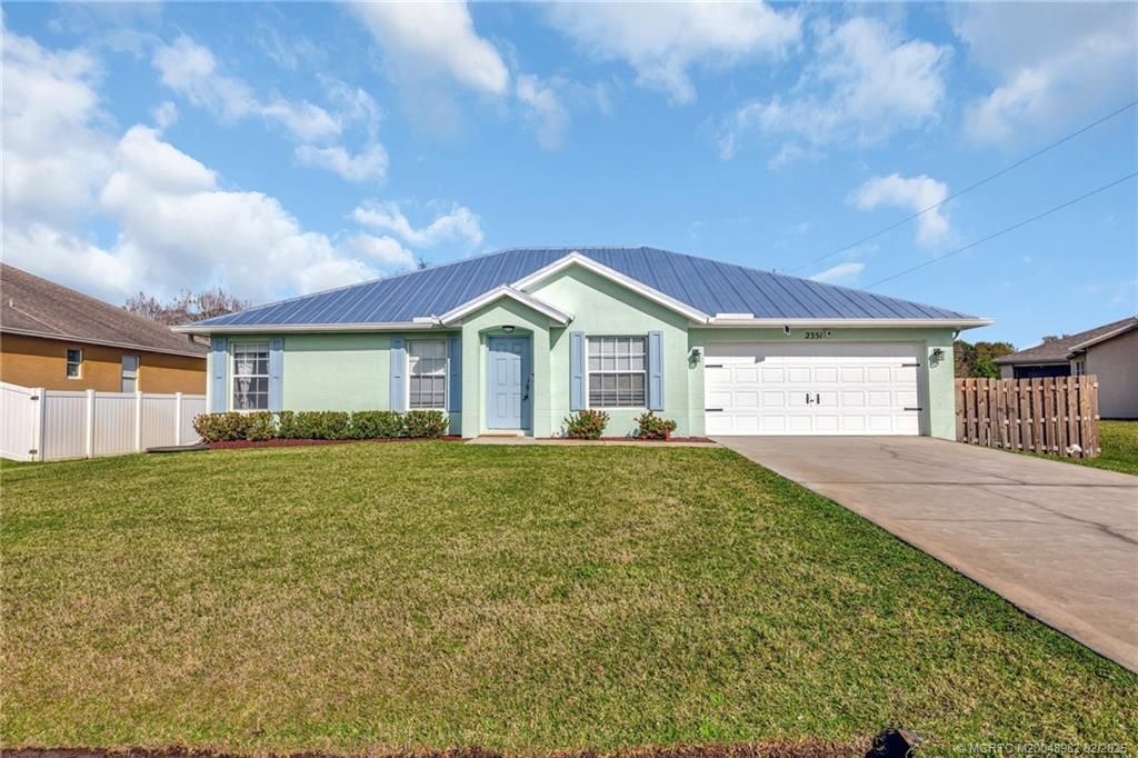 Photo of 2351 SE Maslan Avenue, Port Saint Lucie, FL 34952 (MLS # M20048982)