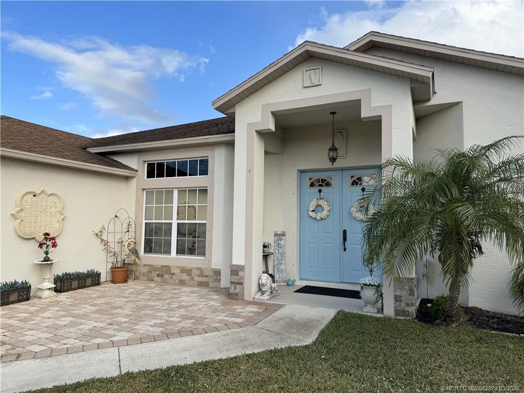 Photo of 2573 SW Calender Street, Port Saint Lucie, FL 34953 (MLS # M20052973)