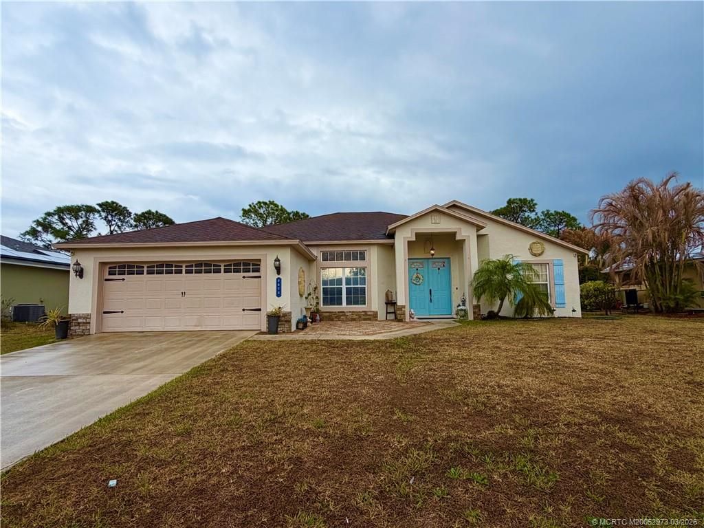 Photo of 2573 SW Calender Street, Port Saint Lucie, FL 34953 (MLS # M20052973)