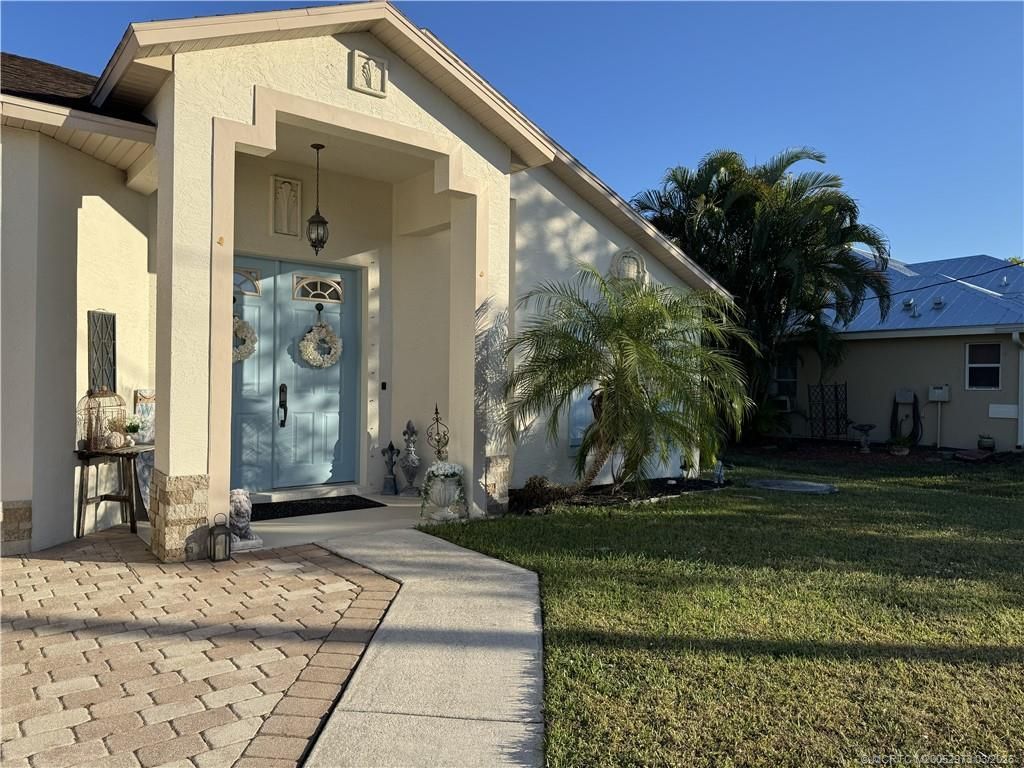 Photo of 2573 SW Calender Street, Port Saint Lucie, FL 34953 (MLS # M20052973)