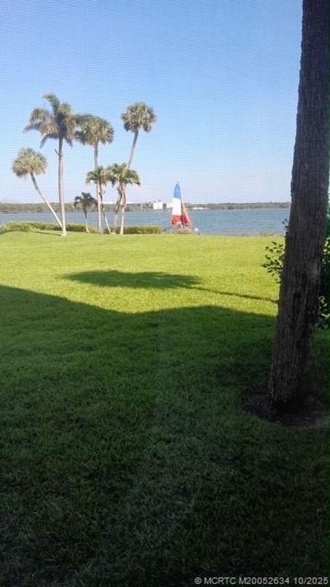 Photo of 3432 NE Causeway Boulevard NE #102, Jensen Beach, FL 34957 (MLS # M20052634)