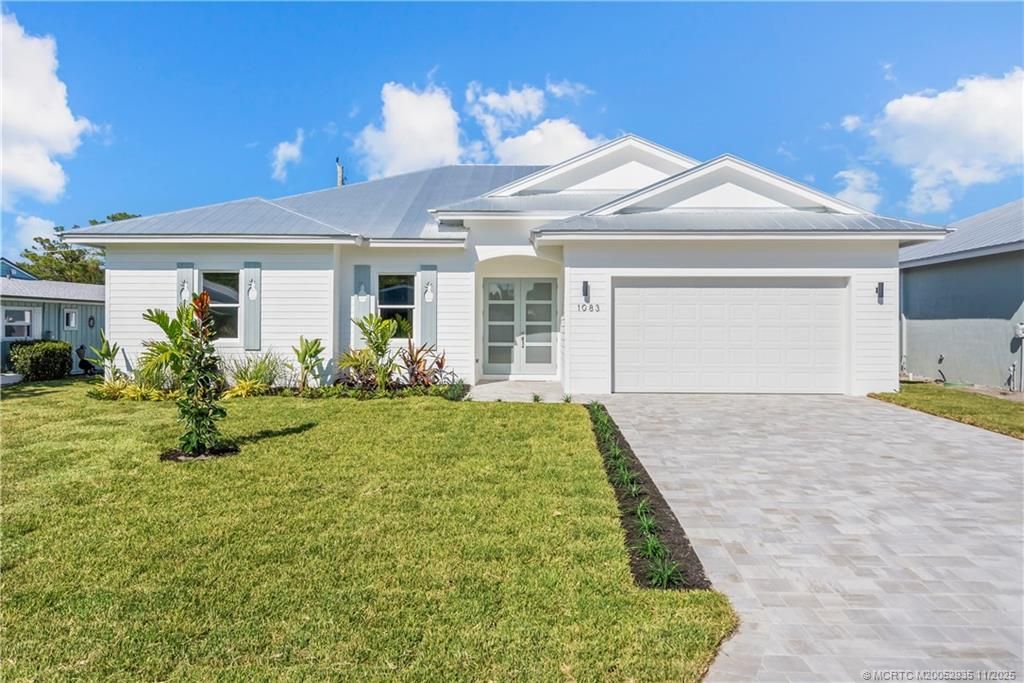 Photo of 1083 NW 12th Terrace, Stuart, FL 34994 (MLS # M20052935)