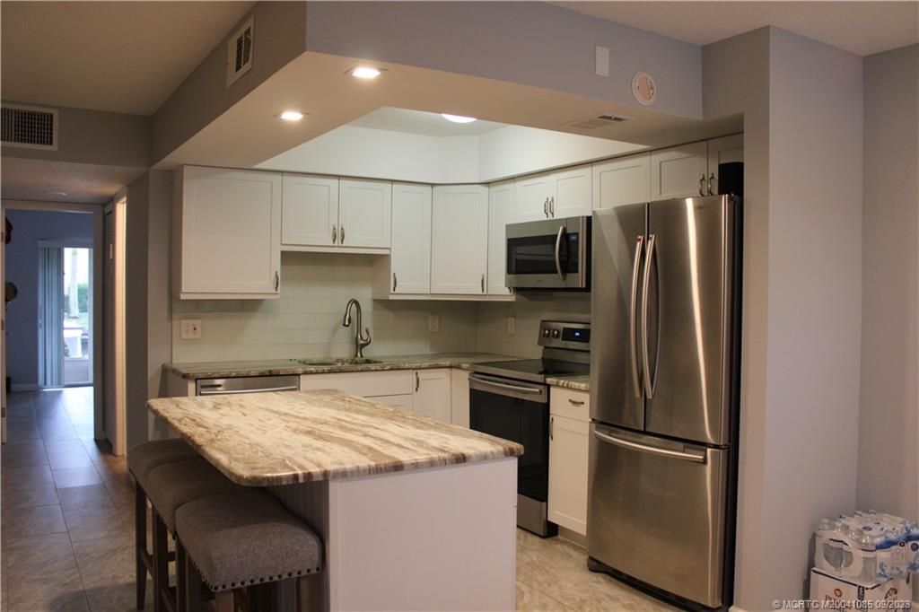 Photo of 2600 S Kanner Highway #T5, Stuart, FL 34994 (MLS # M20041085)