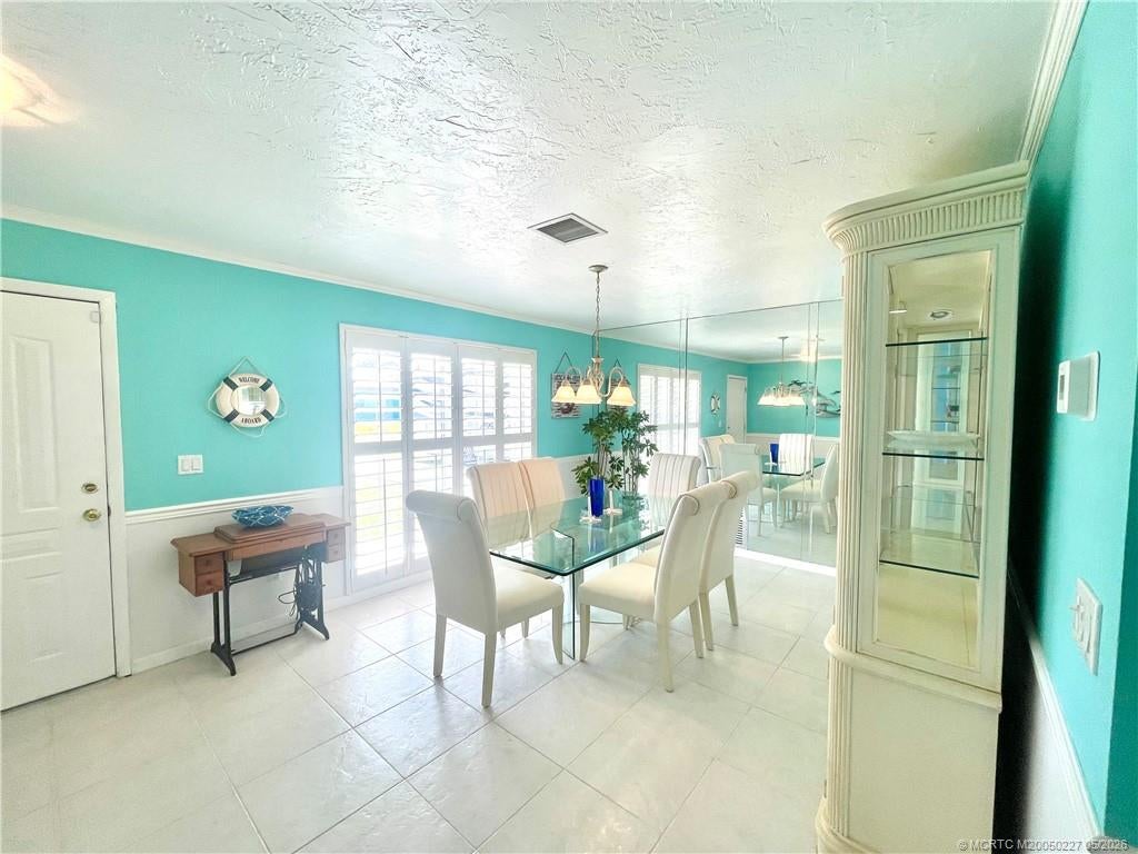 Photo of 880 SE Degan Drive, Port Saint Lucie, FL 34983 (MLS # M20050227)