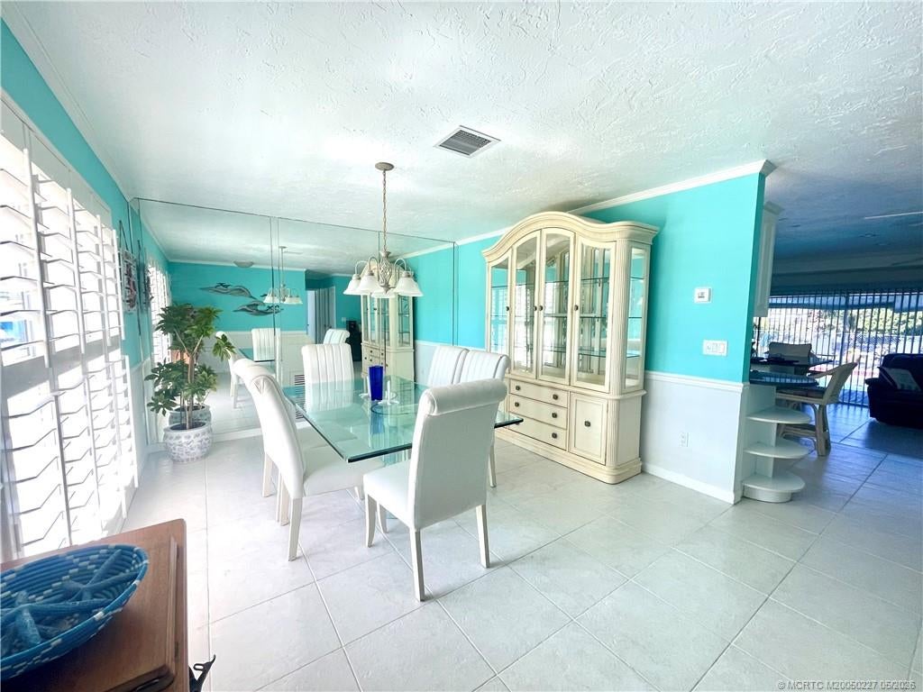Photo of 880 SE Degan Drive, Port Saint Lucie, FL 34983 (MLS # M20050227)