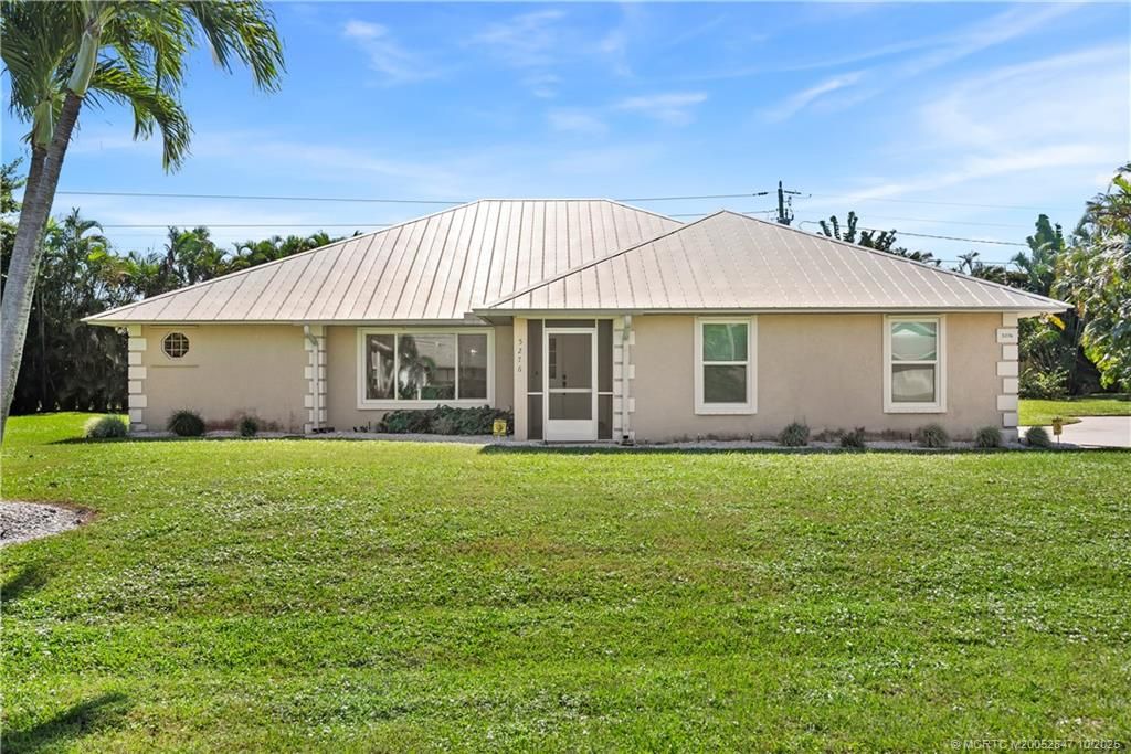 Photo of 5276 SE Harrold Terrace, Stuart, FL 34997 (MLS # M20052847)