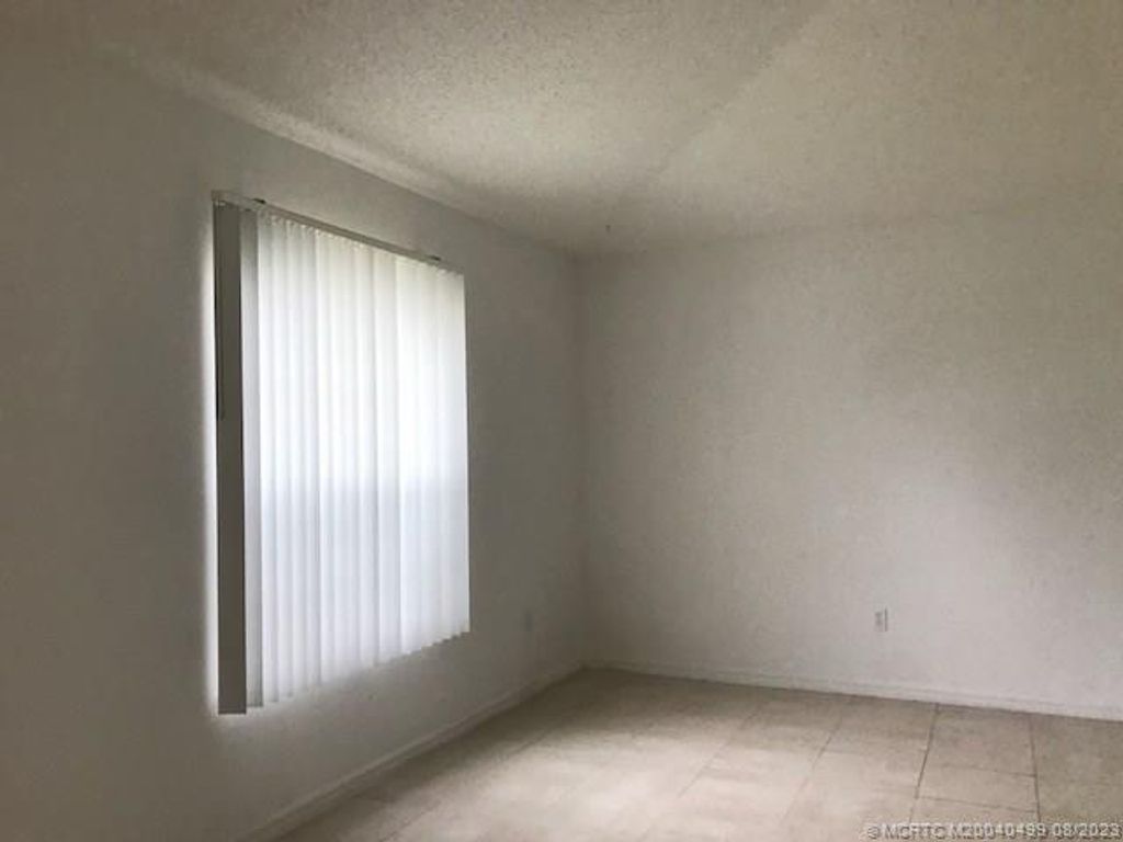 Photo of 1180 SE Ladner Street, Port Saint Lucie, FL 34983 (MLS # M20040499)