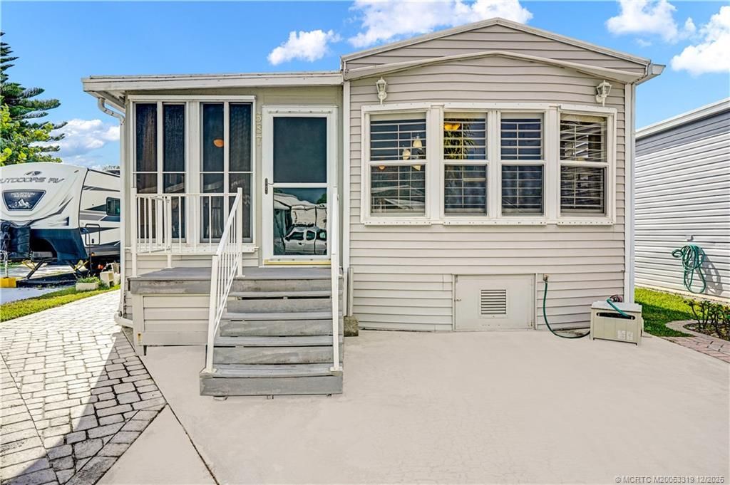 Photo of 587 Nettles Boulevard, Jensen Beach, FL 34957 (MLS # M20053319)