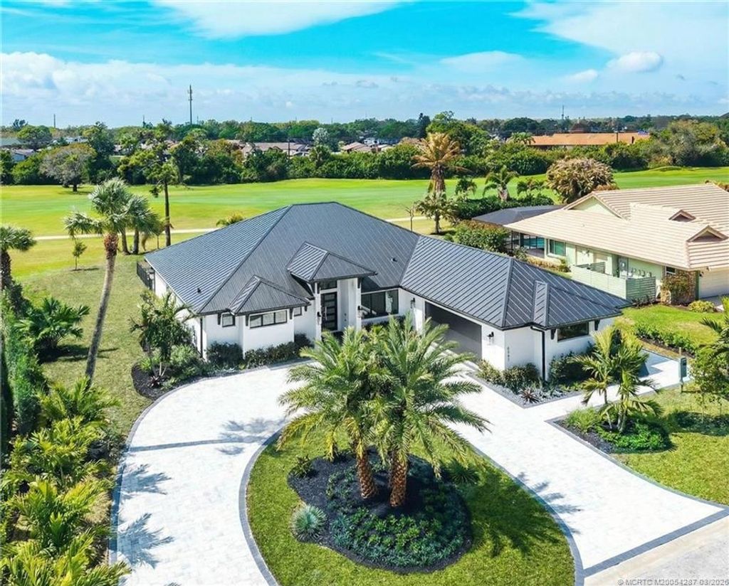 Photo of 5101 SE Burning Tree Circle, Stuart, FL 34997 (MLS # M20054287)