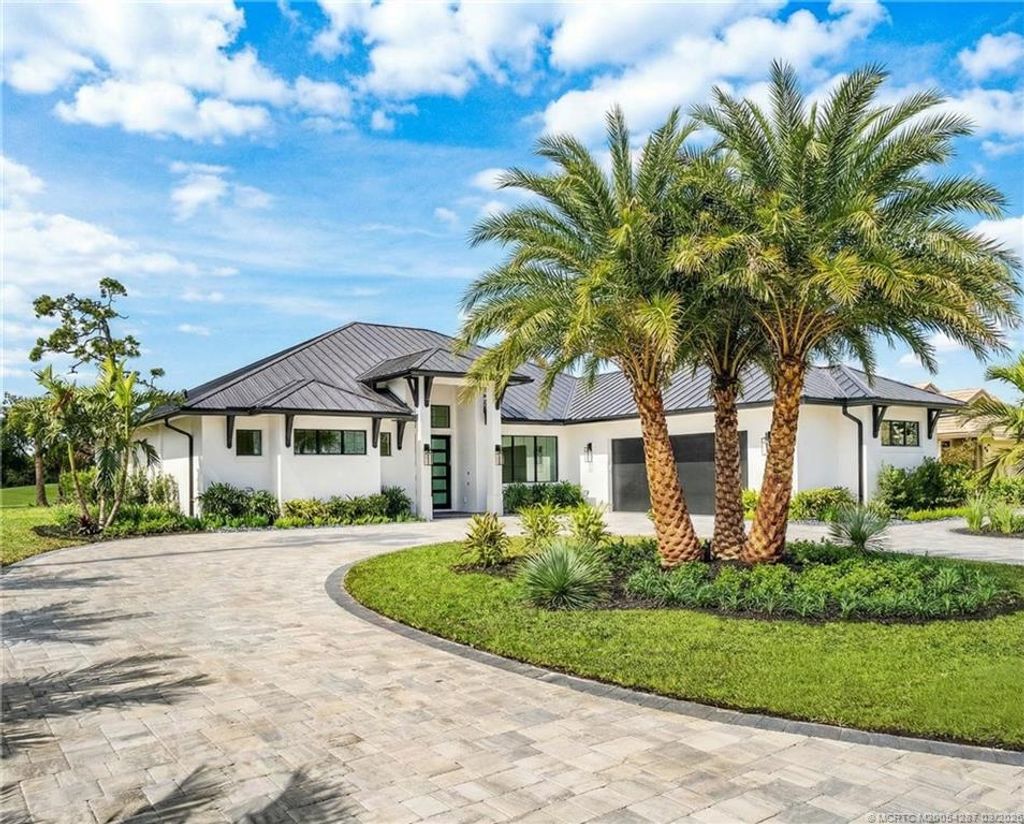 Photo of 5101 SE Burning Tree Circle, Stuart, FL 34997 (MLS # M20054287)