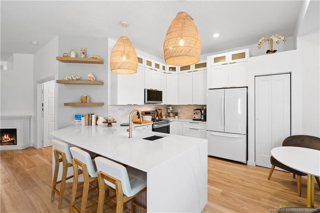 Photo of 5042 SE Devenwood Way, Stuart, FL 34997 (MLS # M20052300)