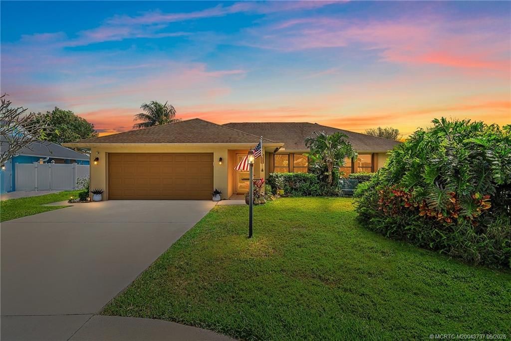 Photo of 1927 NE San Carlos Calle, Jensen Beach, FL 34957 (MLS # M20048737)