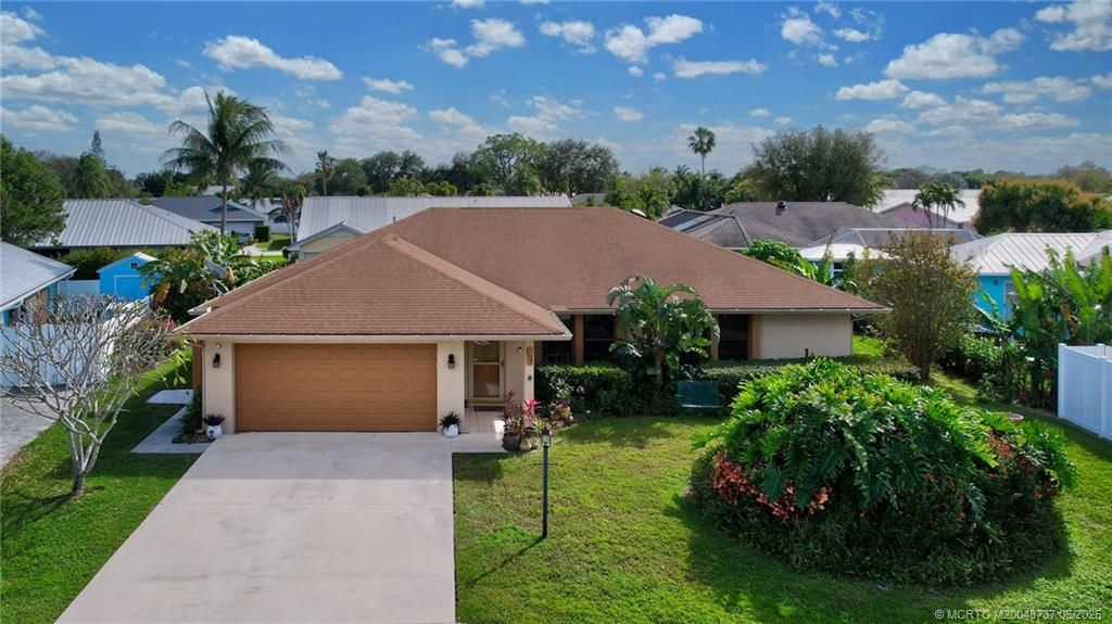 Photo of 1927 NE San Carlos Calle, Jensen Beach, FL 34957 (MLS # M20048737)