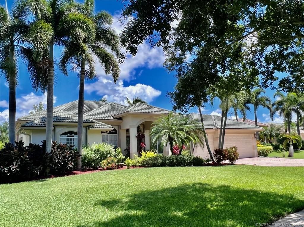 Photo of 2253 SW Dove Canyon Way, Palm City, FL 34990 (MLS # M20042778)