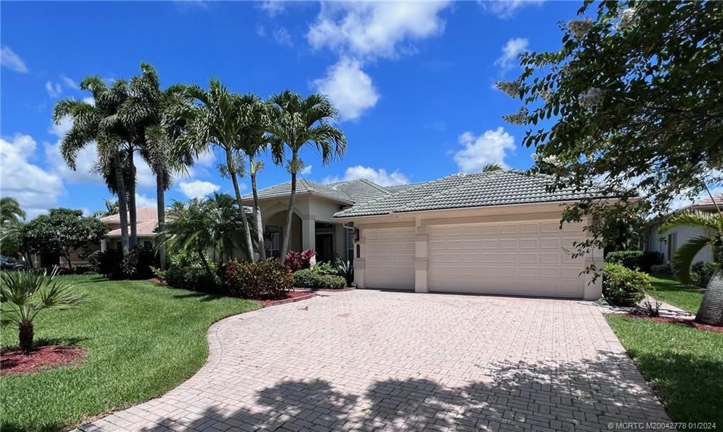 Photo of 2253 SW Dove Canyon Way, Palm City, FL 34990 (MLS # M20042778)