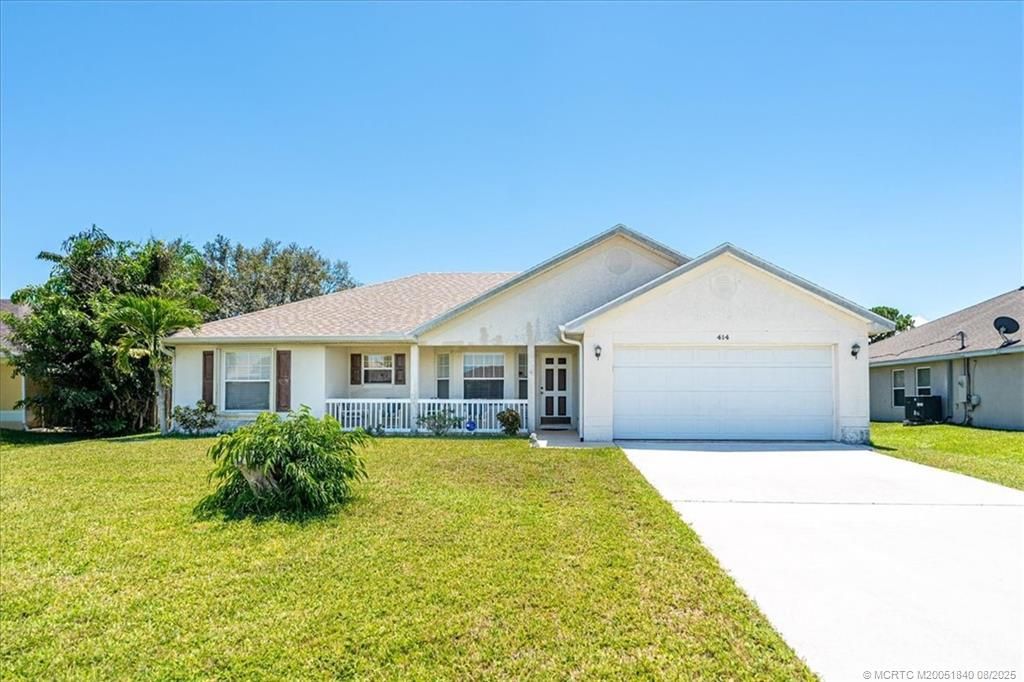Photo of 414 SW Exmore Avenue, Port Saint Lucie, FL 34983 (MLS # M20051840)