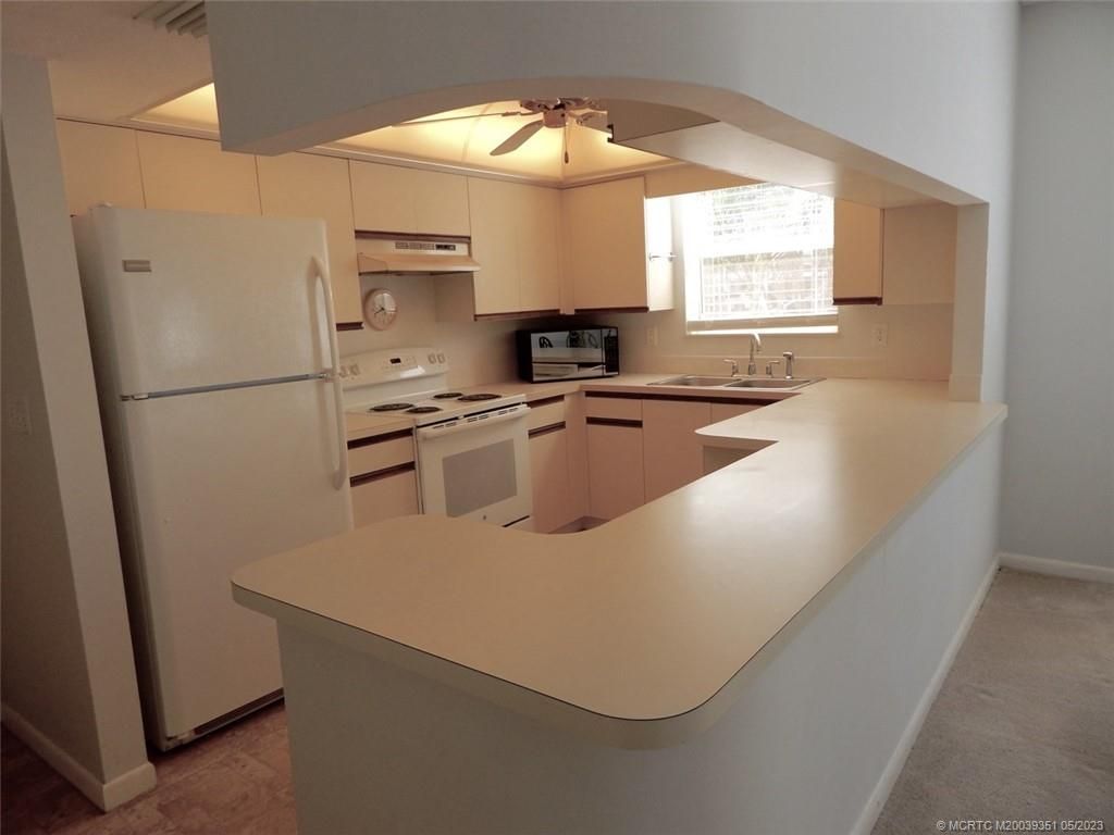 Photo of 2950 SE Ocean Boulevard #120-1, Stuart, FL 34996 (MLS # M20039351)