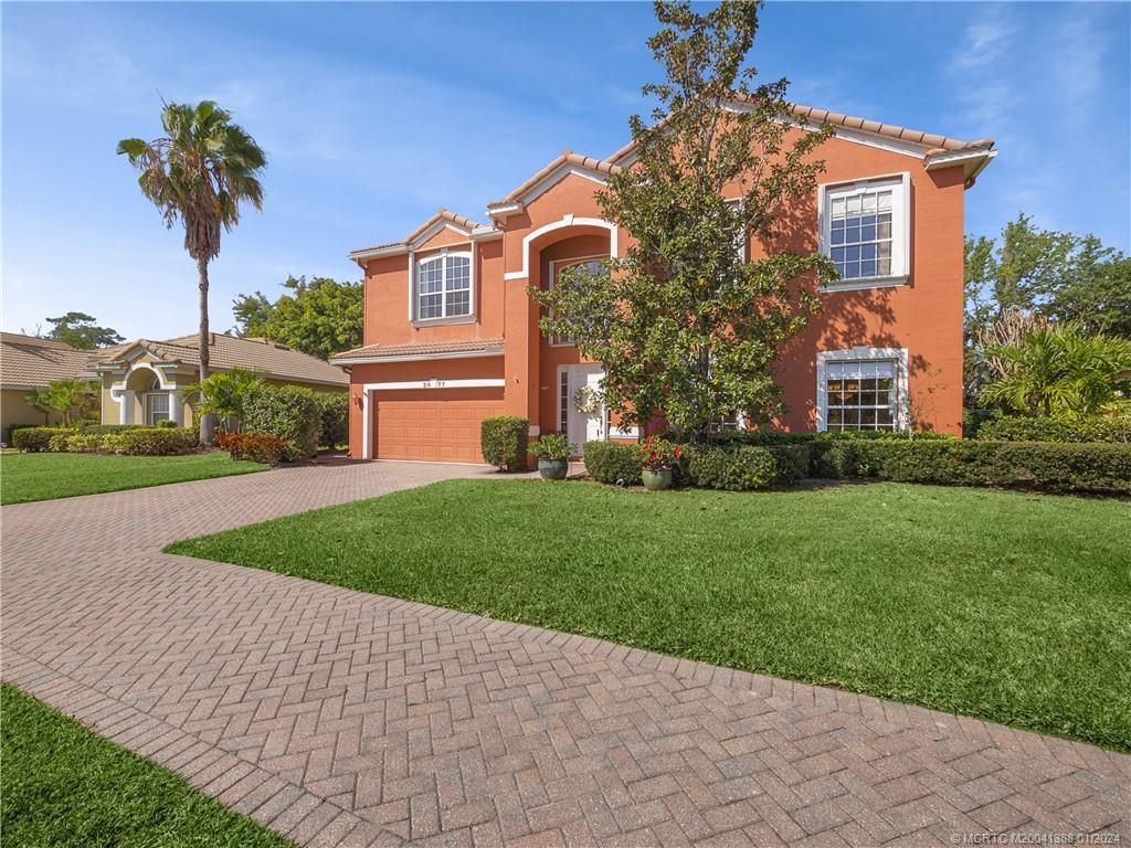 Photo of 2077 SW Panther Trace, Stuart, FL 34997 (MLS # M20041388)