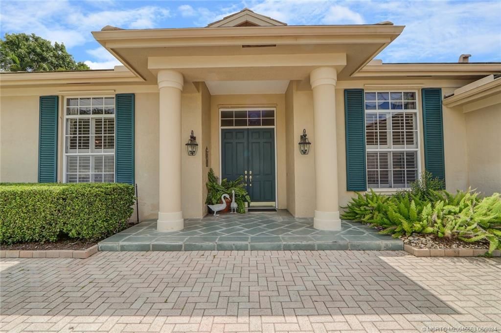 Photo of 995 SW Bromelia Terrace, Stuart, FL 34997 (MLS # M20045553)