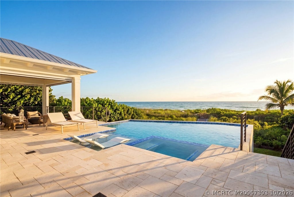 Photo of 4581 NE Ocean Boulevard, Jensen Beach, FL 34957 (MLS # M20057303)