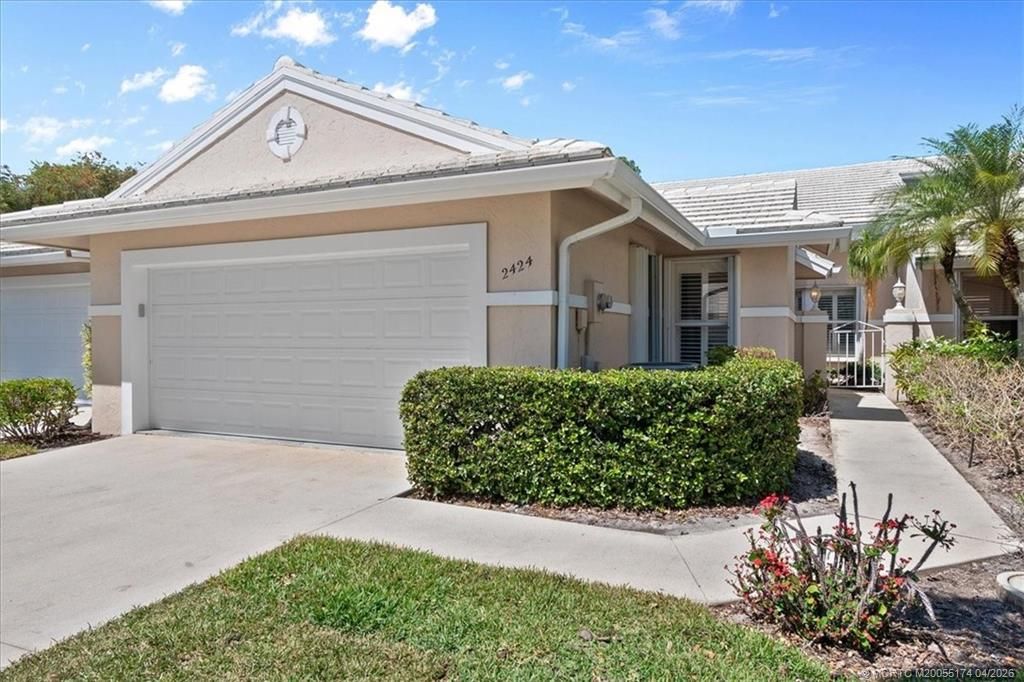 Photo of 2424 SW Foxpoint Trail, Palm City, FL 34990 (MLS # M20055174)