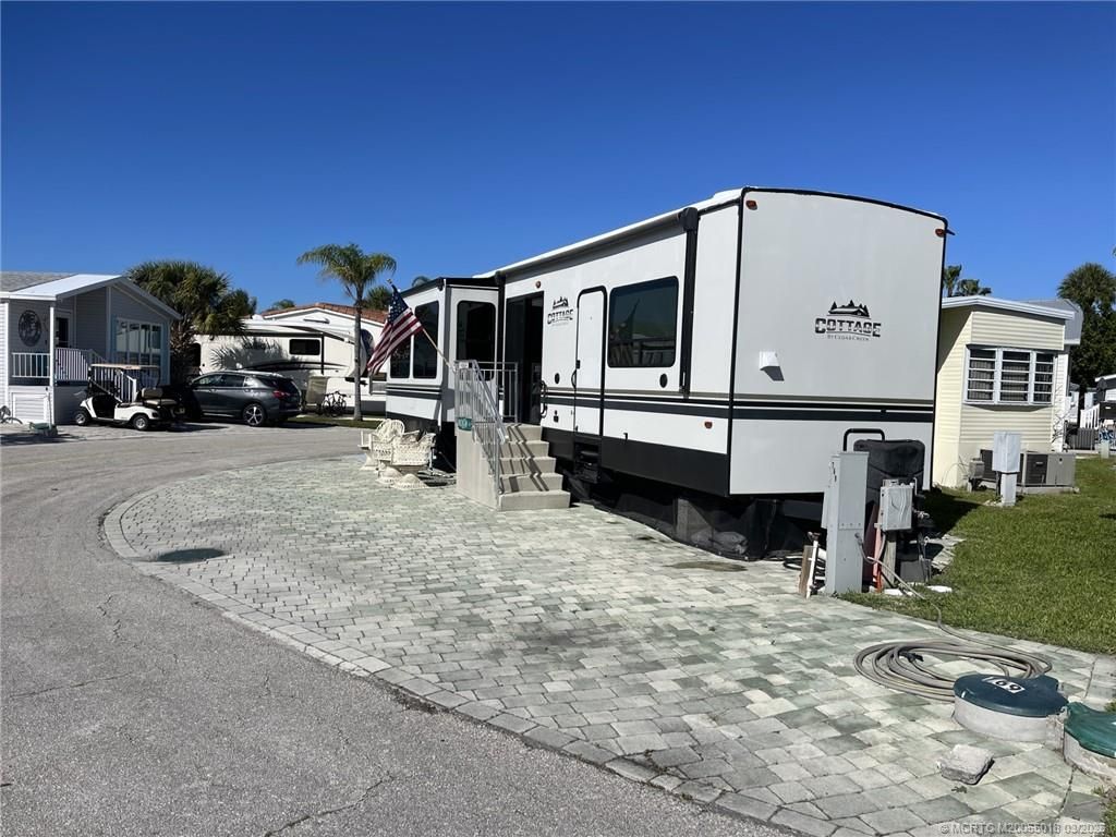 Photo of 769 Nettles Boulevard, Jensen Beach, FL 34957 (MLS # M20055018)