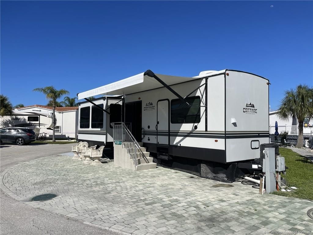 Photo of 769 Nettles Boulevard, Jensen Beach, FL 34957 (MLS # M20055018)