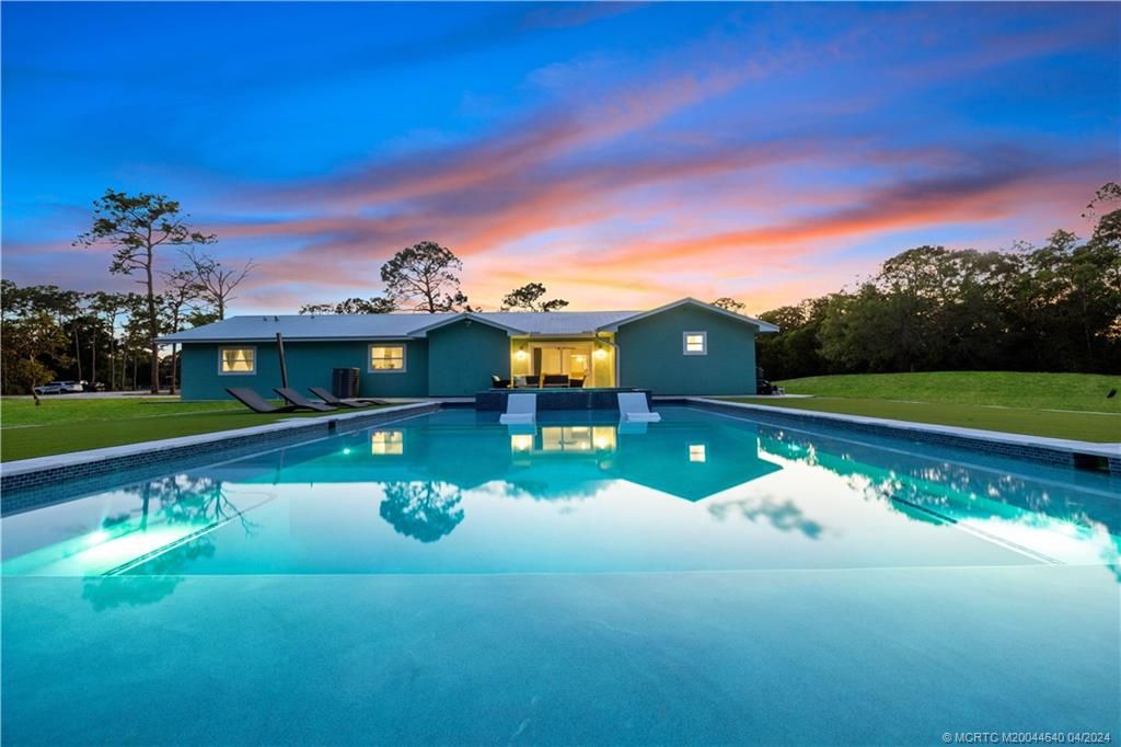 Photo of 3951 SW 42nd Avenue, Palm City, FL 34990 (MLS # M20044640)